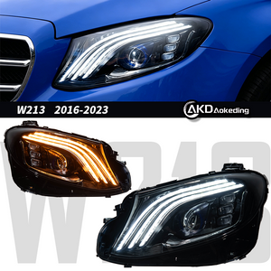 AKD headlight assembly for 2016-2023 Mercedes-Benz E-Class W213 models, modified with Maybach-style LED projector headlights and daytime running lights.